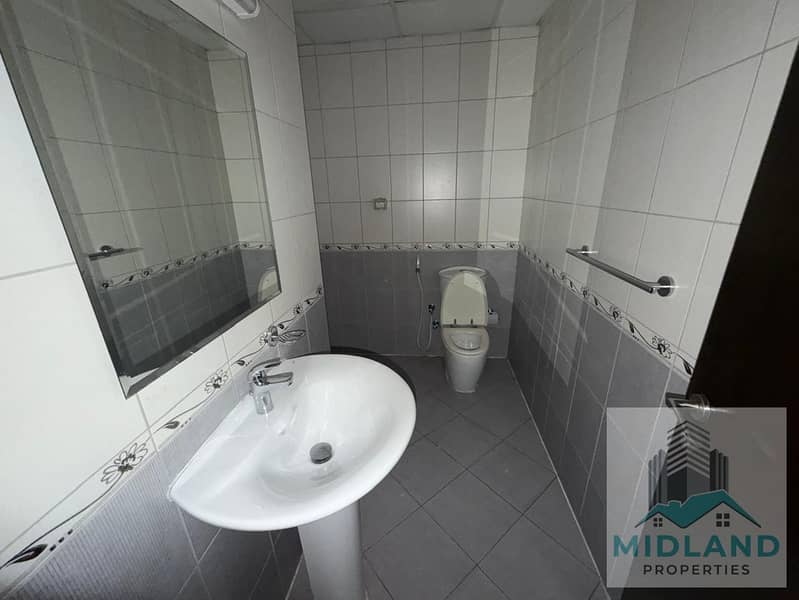 Spacious 1-Bedroom Apartment for Rent | Al Rabia Tower, Majan, Dubai - Image 12