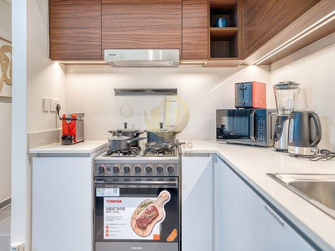 High-Floor 2BR | Full Water Views | Luxury Furnished - Image 10