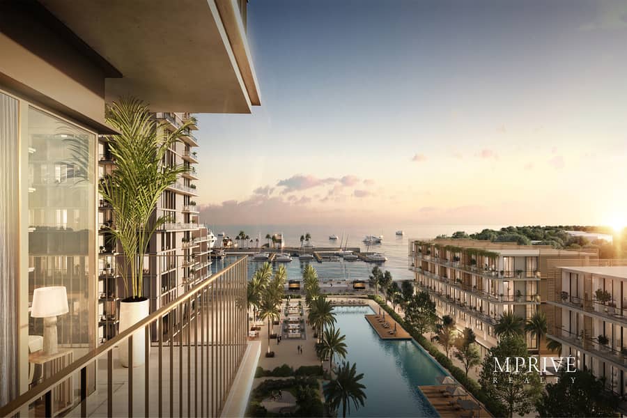 Seafront Community | Pool and Burj View - Image 11