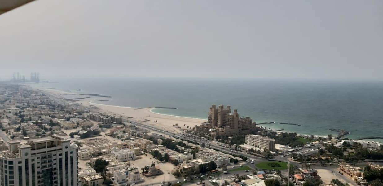 hot offer  3 bhk full sea view with parking  for sale in Ajman one tower