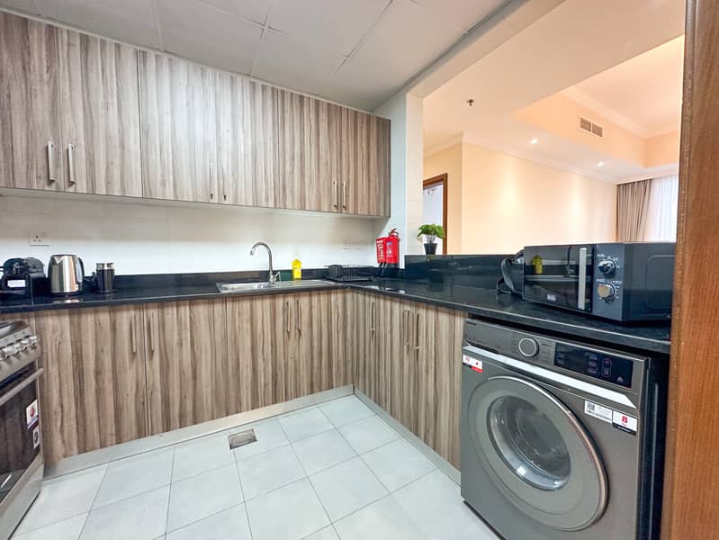 Elegant 1BR in Dunya Tower, Downtown Dubai - Image 14