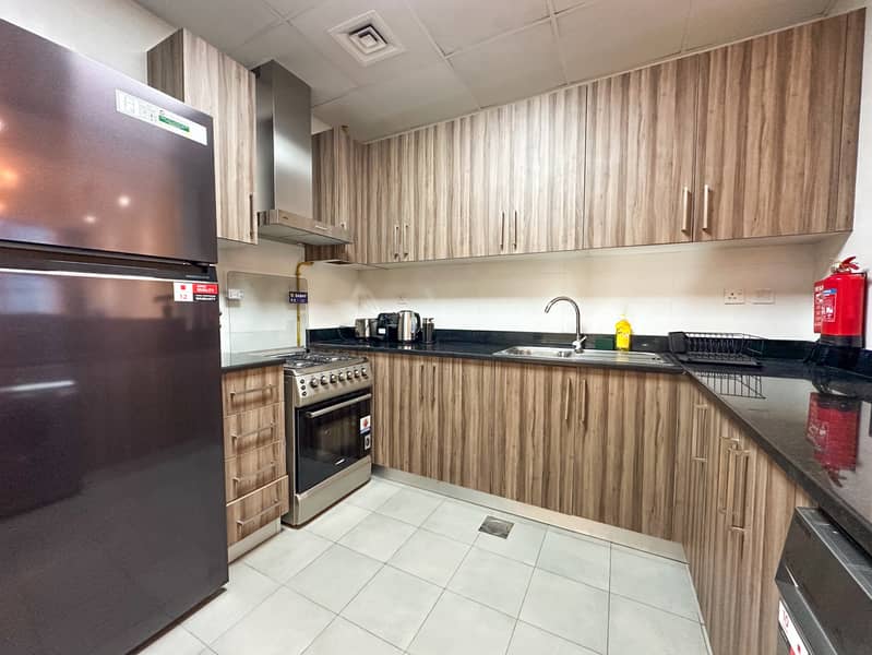 Elegant 1BR in Dunya Tower, Downtown Dubai - Image 15