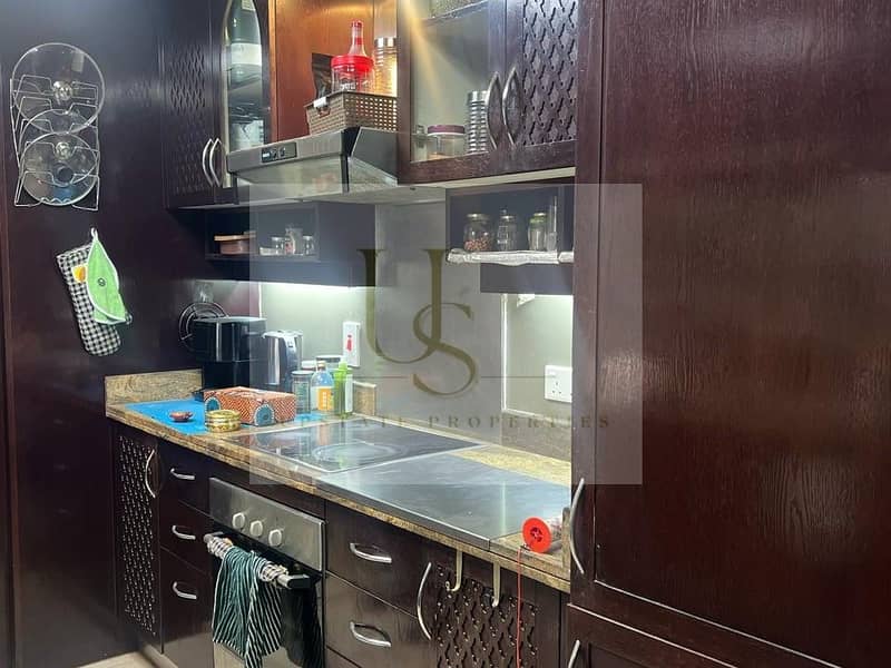 Direct Access to Dubai Mall | Accessible Area | Fully Furnished - Image 7