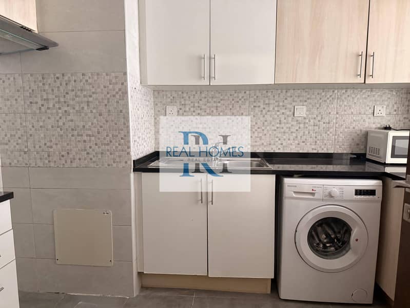 Bright One bedroom Apartment| Semi furnished | JVC - Image 16