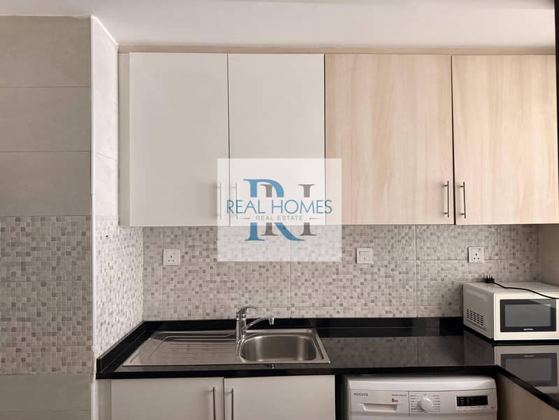 Bright One bedroom Apartment| Semi furnished | JVC - Image 17