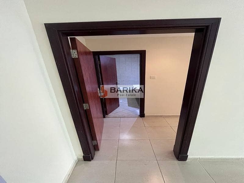 Bright 1BR Apartment| Olympic Park 3 |Dubai Sports - Image 9