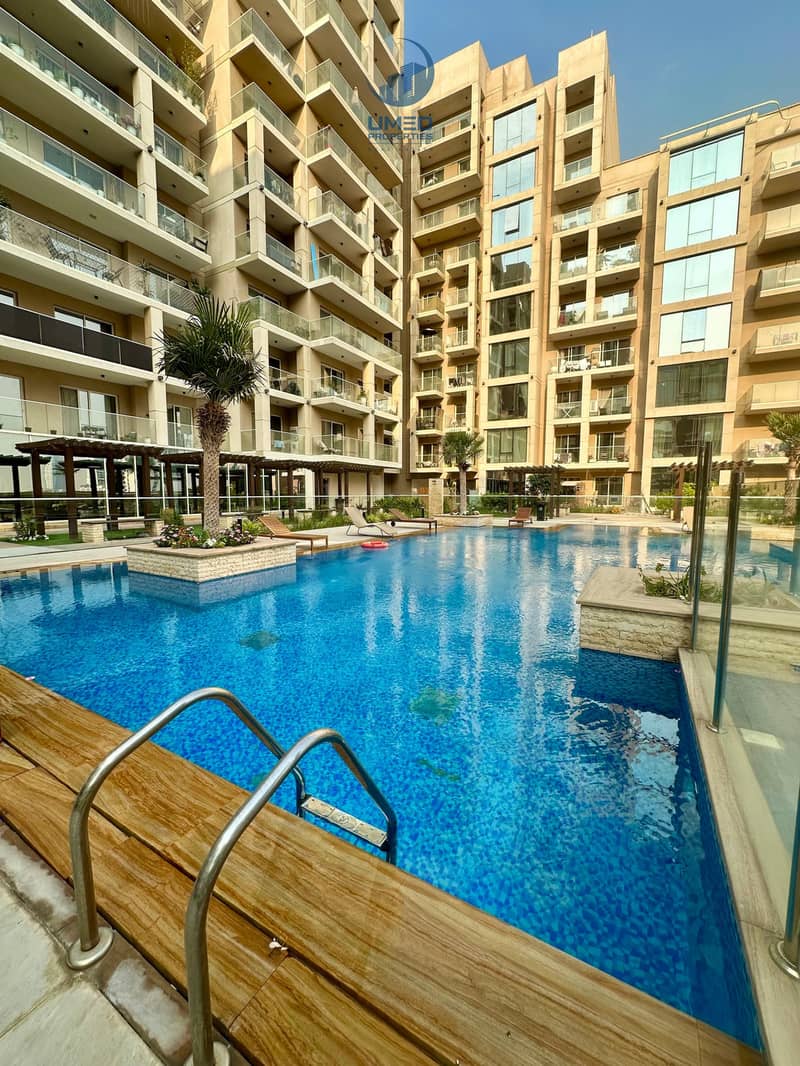 Modern Apartment with Balcony | Prime Location | Pool View - Image 22