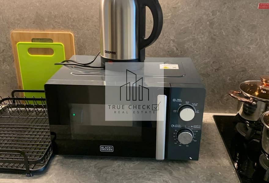 Elegant Studio | High End Finishes | Well Maintained