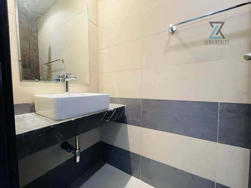 Bright 1-Bedroom Apartment with all Amenities in Nad Al Hamar - Image 9