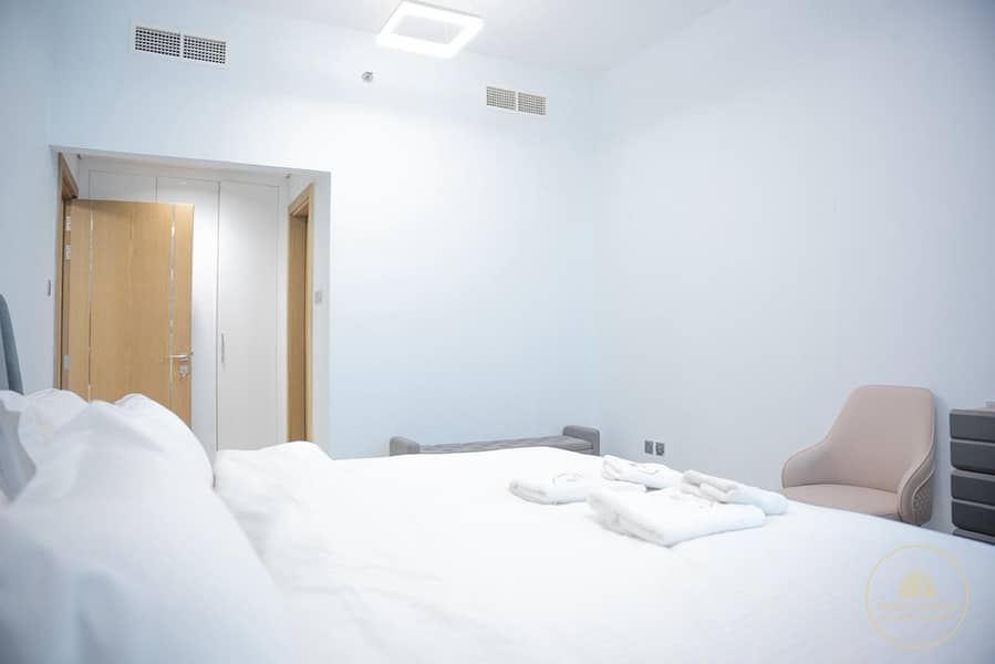 - Modern 1BR Retreat Paradise View 1 Pool & Gym Access