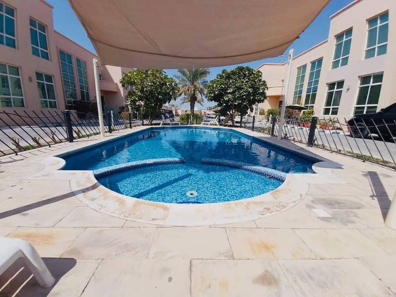 Hot offer. . . . . . 5BR villa with pool in khalifa city A