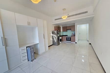 Studio for Rent in Jumeirah Village Circle (JVC), Dubai - Pool View | White Goods | Near Mall | Low Floor