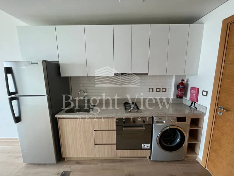 SEMI FURNISHED STUDIO CHILLER FREE ROAD FACING