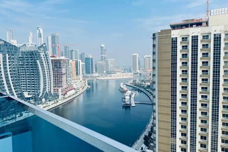 Studio for Rent in Business Bay, Dubai - CANAL & CITY VIEW | FLEXIBLE CHEQUES | HIGHER FLOOR | FURNISHED
