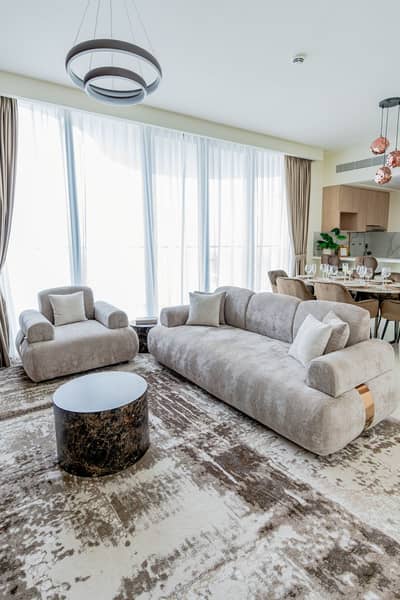 شقة 2 غرفة نوم للايجار في میناء العرب، رأس الخيمة - living area . jpg
