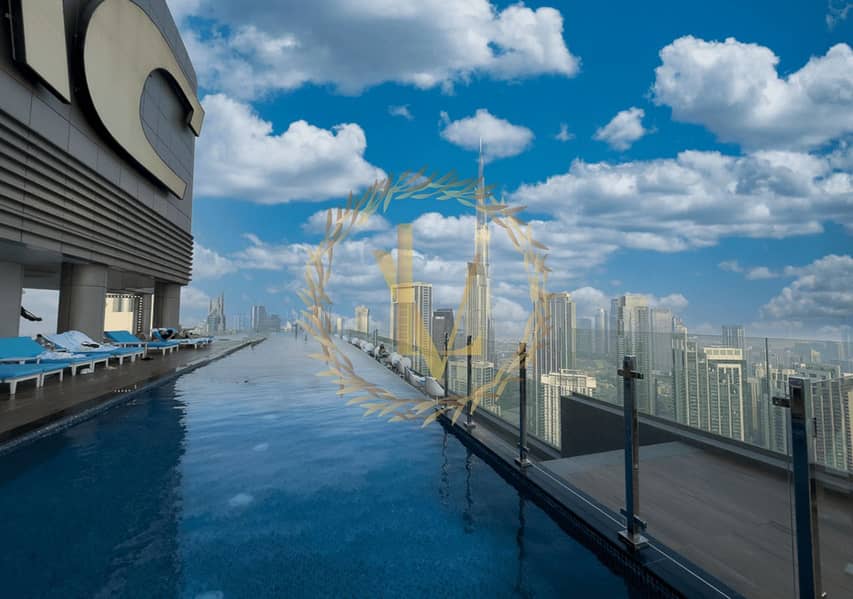 55th Floor Luxury Apartment with Burj View & Infinity Pool in Paramount Midtown Hotel