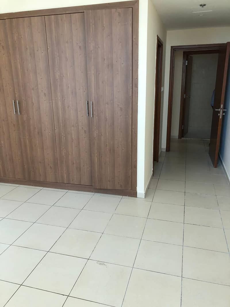 HOT DEAL !! SPACIOUS 2 BEDROOM HALL KITCHEN WITH PARKING FOR SALE IN AJMAN ONE TOWER.