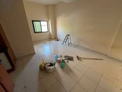 A spacious studio apartment in a prime location with central air conditioning, available for annual rent at a price suitable for everyone.