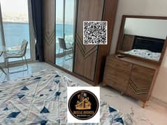 عرض مميز! استوديو فارغ للبيع بسعر مخفض، مع موقف سيارات، مفروش، شرفة، وإطلالة على الخور، في موقع متميز في أبراج الواحة.