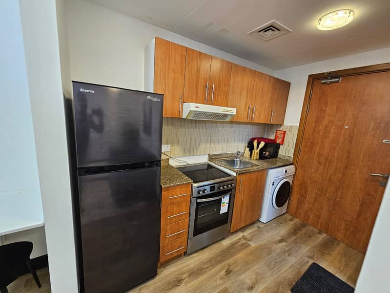 Wooden Flooring Furnished || Modern Design Studio || With Lake View || Near Me'aisem City Centre - Image 11