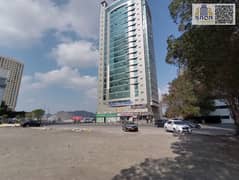 One bedroom and living room in Fujairah, prime location opposite Sheikh Zayed Mosque. Free air conditioning and gas.