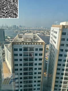 شقة غرفتين وصالة واسعة للإيجار في برج عجمان بيرل، الراشدية 1، عجمان