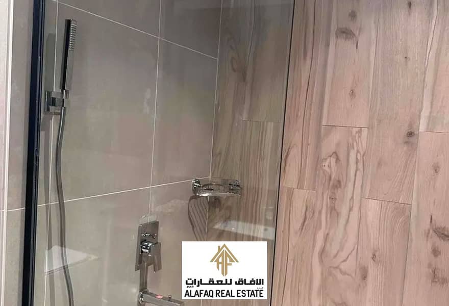 Luxury Apartment - 2 Bedrooms for Sale in Ajman One Faces 2 - Image 18