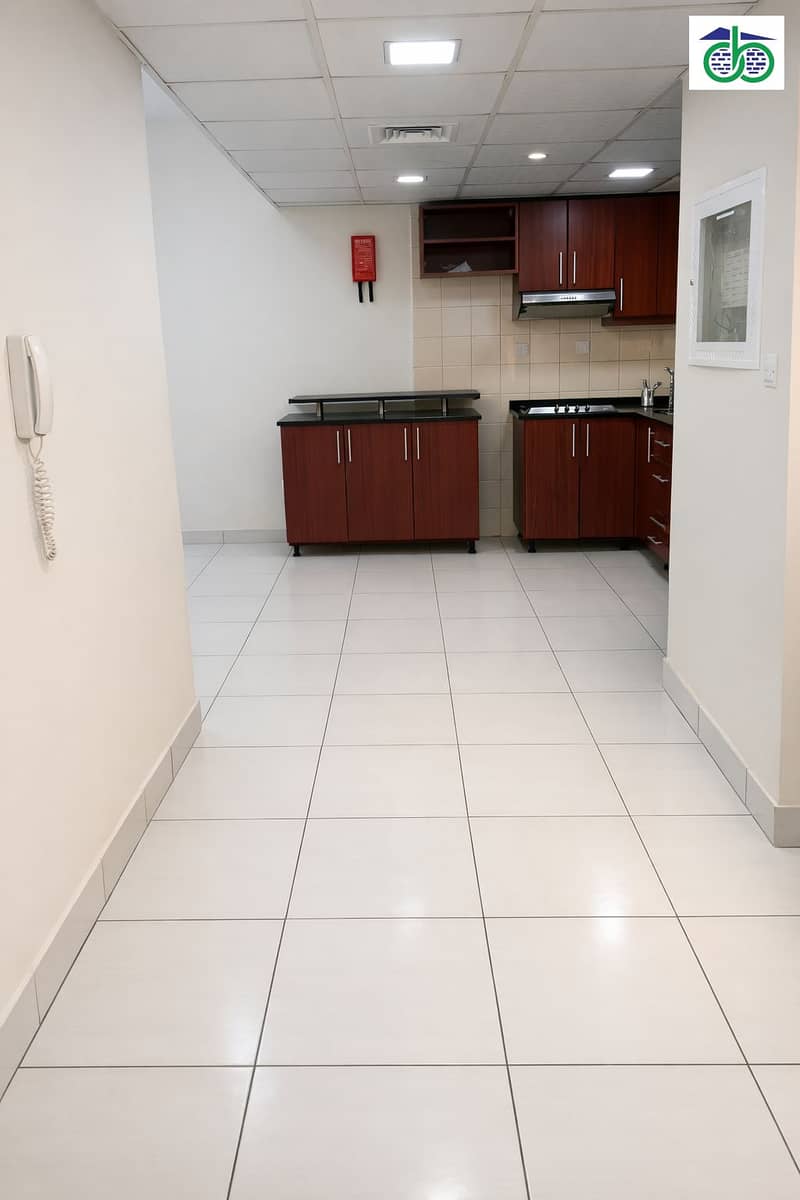 3 Modern kitchen view from hallway. png