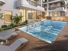 شقة في ييغو 26،منطقة مركز الأعمال،المدينة العالمية 1 غرفة 942888 درهم - 14051396