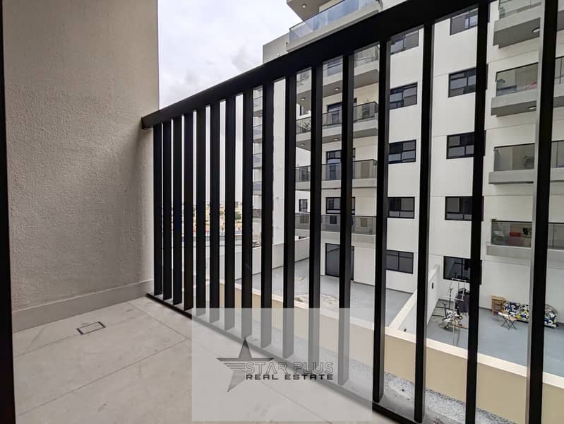 BRAND NEW SPACIOUS 1 BEDROOM APARTMENT WITH CLOSED KITCHEN,2 BALCONIES HAVING GYM,POOL AND COVERED PARKING.