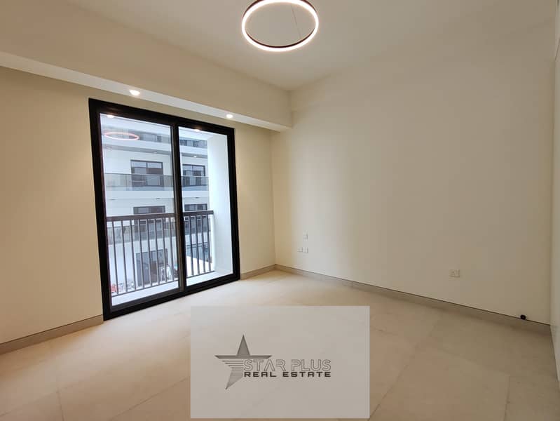BRAND NEW SPACIOUS 1 BEDROOM APARTMENT WITH CLOSED KITCHEN,2 BALCONIES HAVING GYM,POOL AND COVERED PARKING.