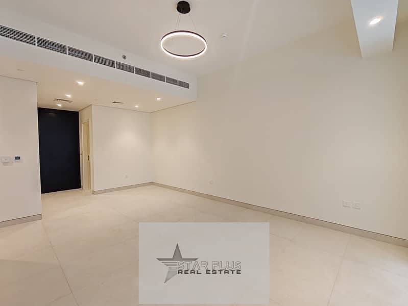 BRAND NEW SPACIOUS 1 BEDROOM APARTMENT WITH CLOSED KITCHEN,2 BALCONIES HAVING GYM,POOL AND COVERED PARKING.