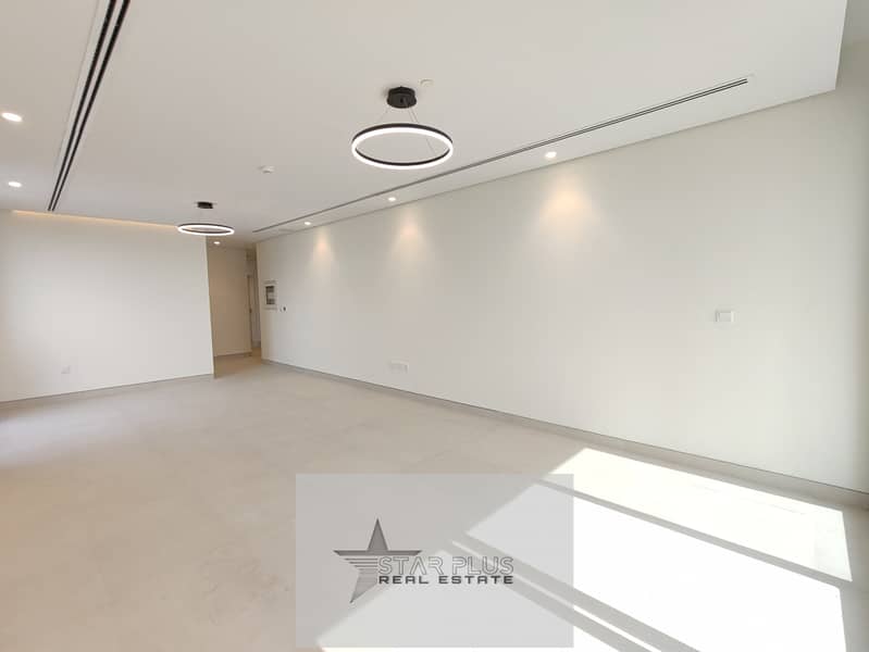 BRAND NEW SPACIOUS 2 + MAID ROOM WITH SPACIOUS LIVING ROOM,BIG CLOSED KITCHEN HAING GYM,POOL AND COVERED PARKING.