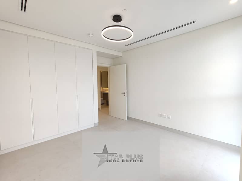 BRAND NEW SPACIOUS 2 + MAID ROOM WITH SPACIOUS LIVING ROOM,BIG CLOSED KITCHEN HAING GYM,POOL AND COVERED PARKING. - Image 9
