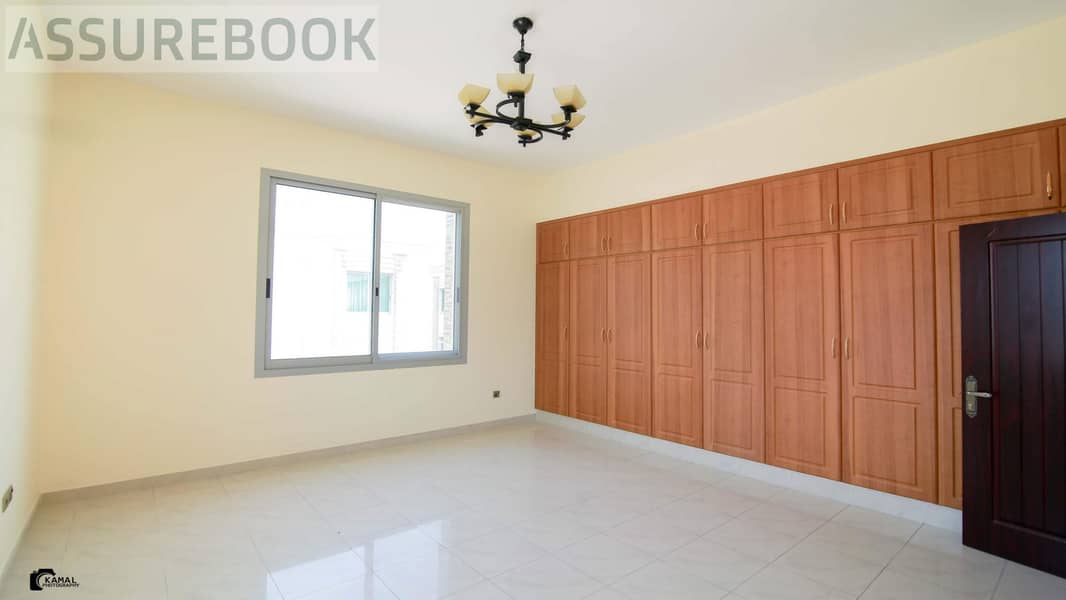 Spacious 5BR Corner Villa with Private Pool & Garden | Al Manara - Image 13