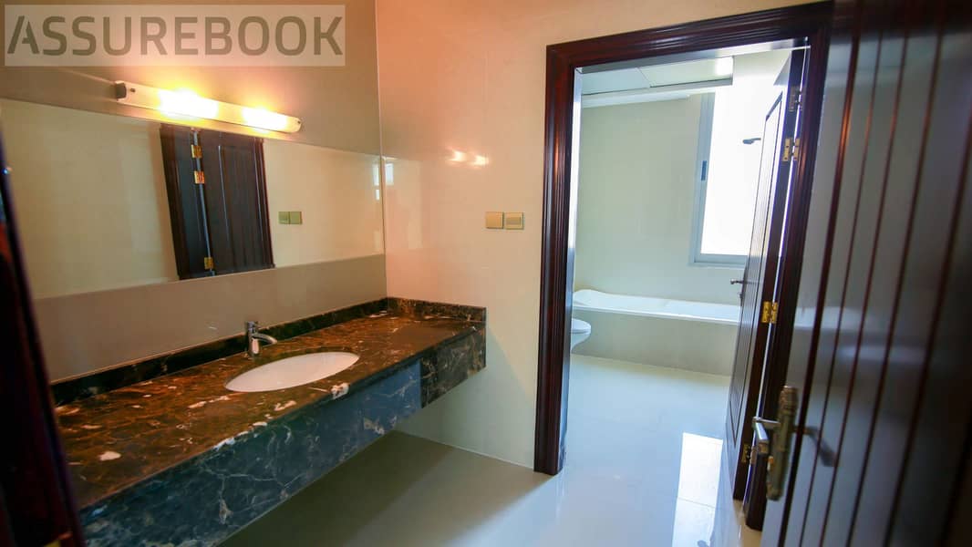 Spacious 5BR Corner Villa with Private Pool & Garden | Al Manara - Image 14