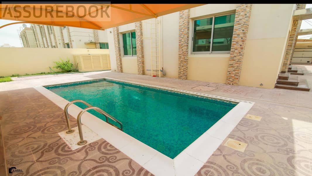 Spacious 5BR Corner Villa with Private Pool & Garden | Al Manara - Image 16