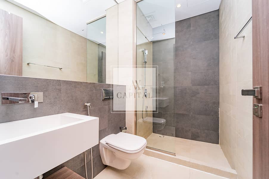 Modern Unfurnished | Burj View | Prime Location - Image 13