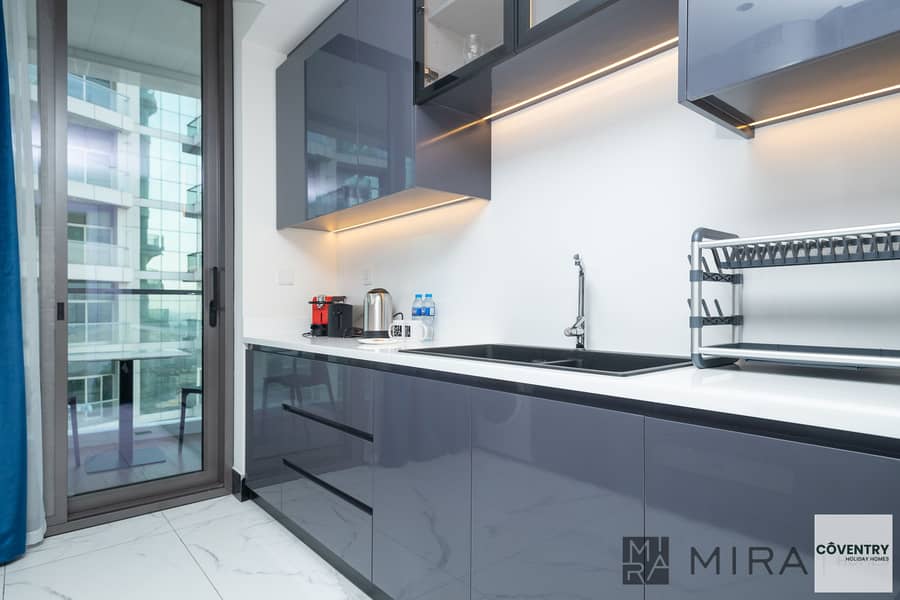 Elegant 1BR | Canal View | Business Bay | Short-Term Stay - Image 12