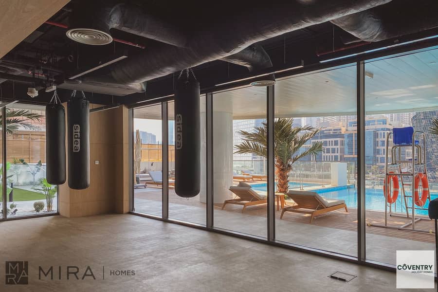 Elegant 1BR | Canal View | Business Bay | Short-Term Stay - Image 36