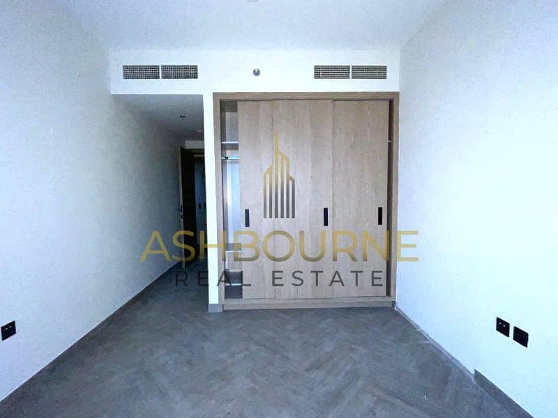 1BR+MAID | POOL AND BURJ VIEW | WELL MAINTAINED - Image 4