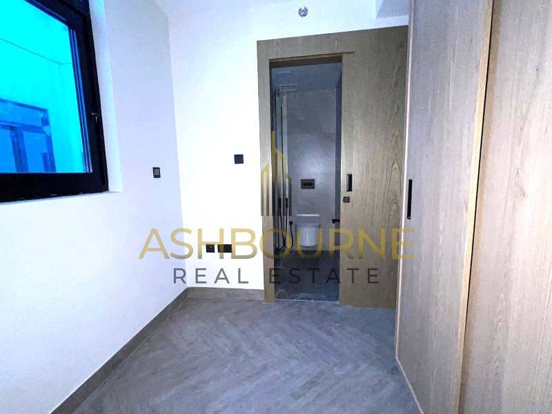 1BR+MAID | POOL AND BURJ VIEW | WELL MAINTAINED - Image 8