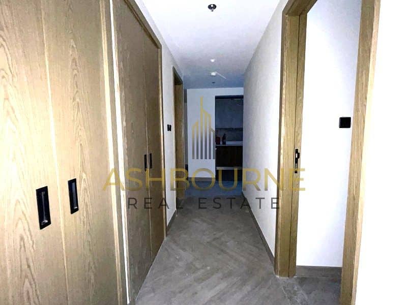 1BR+MAID | POOL AND BURJ VIEW | WELL MAINTAINED - Image 9
