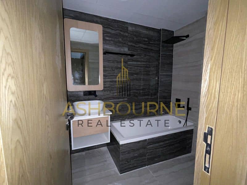 1BR+MAID | POOL AND BURJ VIEW | WELL MAINTAINED - Image 14