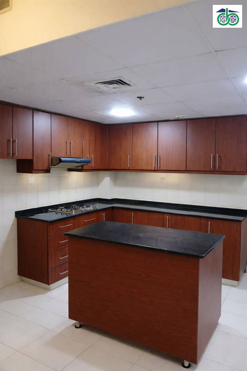 4 Modern L-shaped kitchen with sleek finishes. png