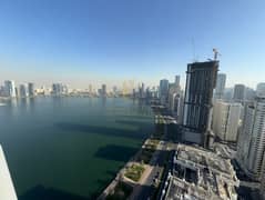 للبيع شقة غرفتين وصالة مع اطلالة جانبية في برج الدانة