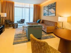 شقة فاخرة بغرفة نوم واحدة | مفروشة بالكامل | إطلالة على المجتمع