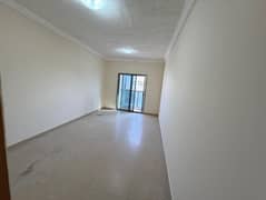 For annual rent: A two-bedroom apartment with a living room in Al Rawda 3,