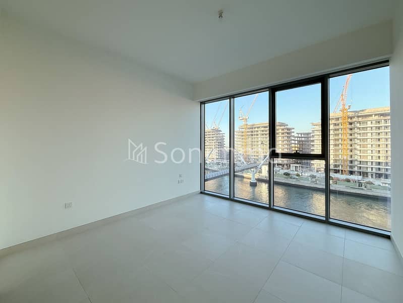 Canal-Front 2BR | Spacious Layout | Prime Location - Image 12