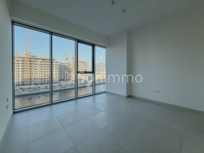 Canal-Front 2BR | Spacious Layout | Prime Location - Image 13